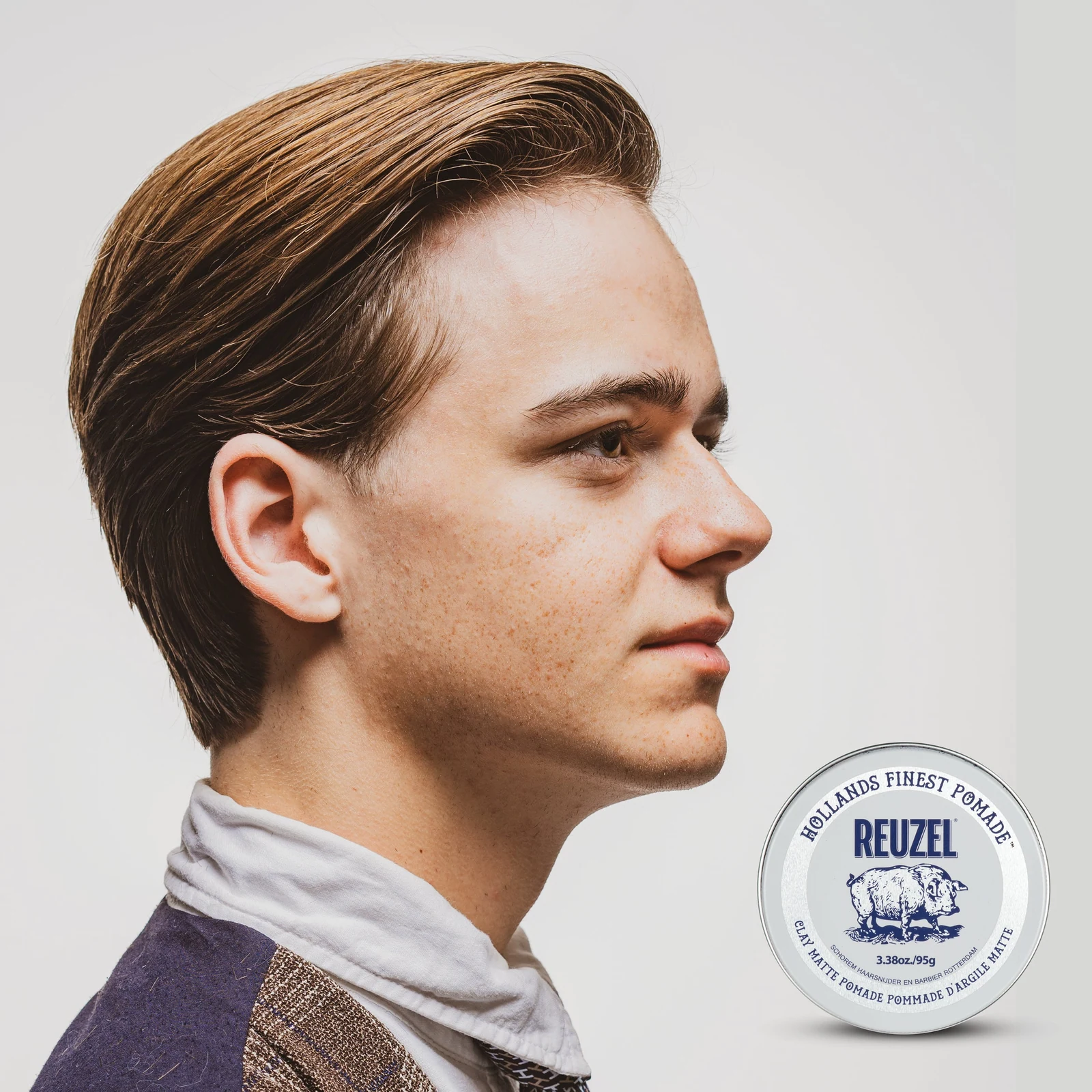 Model with hair styled with Clay Matte Pomade