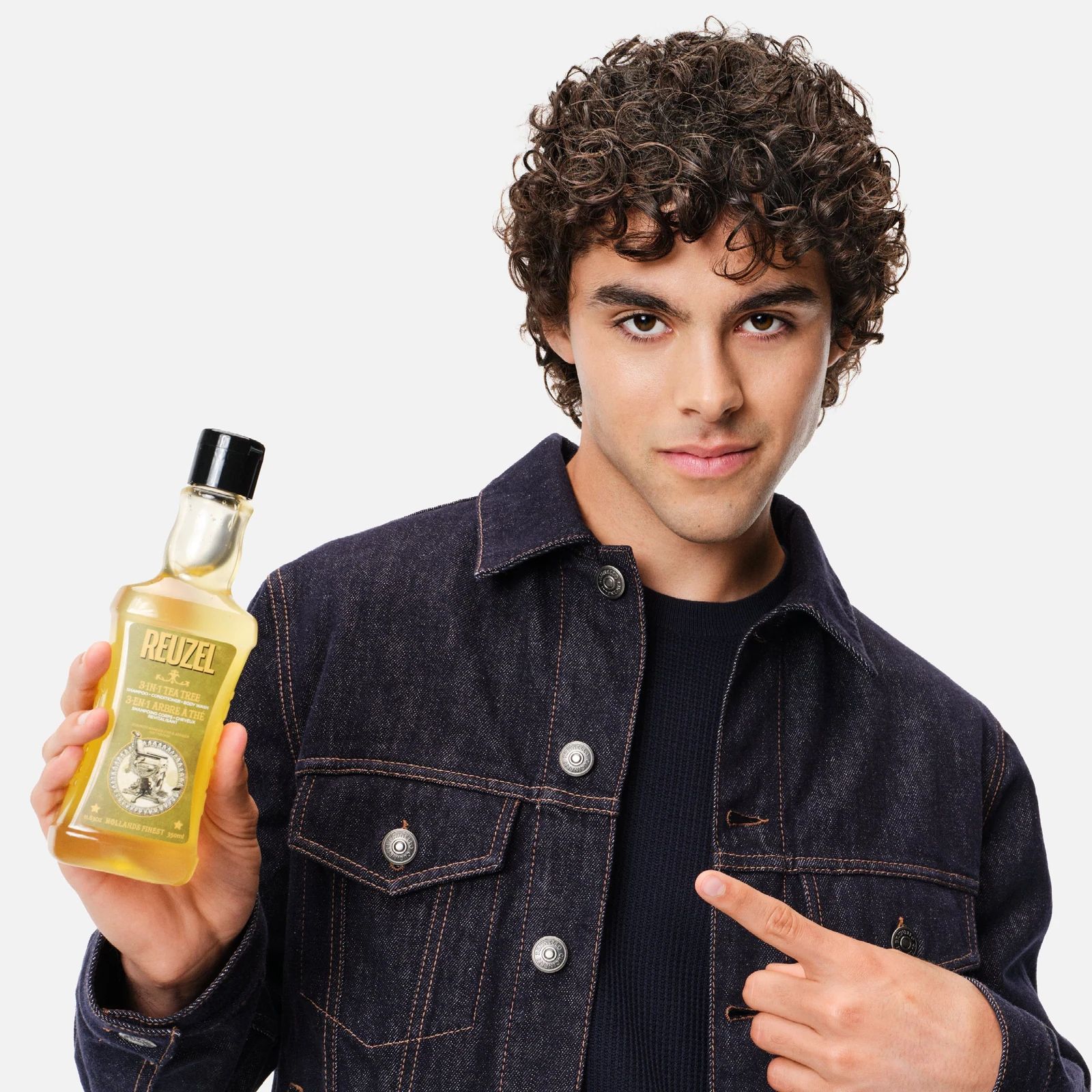 Reuzelinc 3-in-1 Tea Tree Shampoo bottle with label, featuring natural tea tree ingredients and a sleek design., view 10