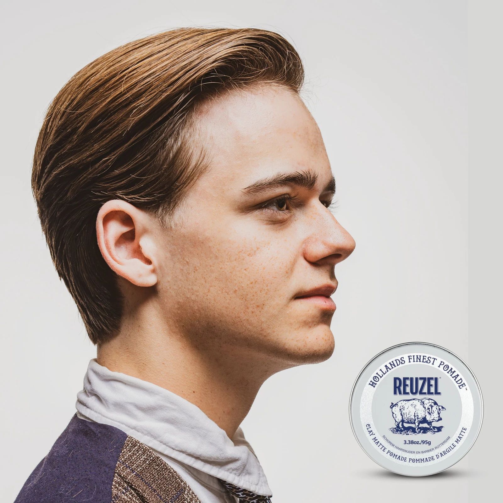Model with hair styled with Clay Matte Pomade