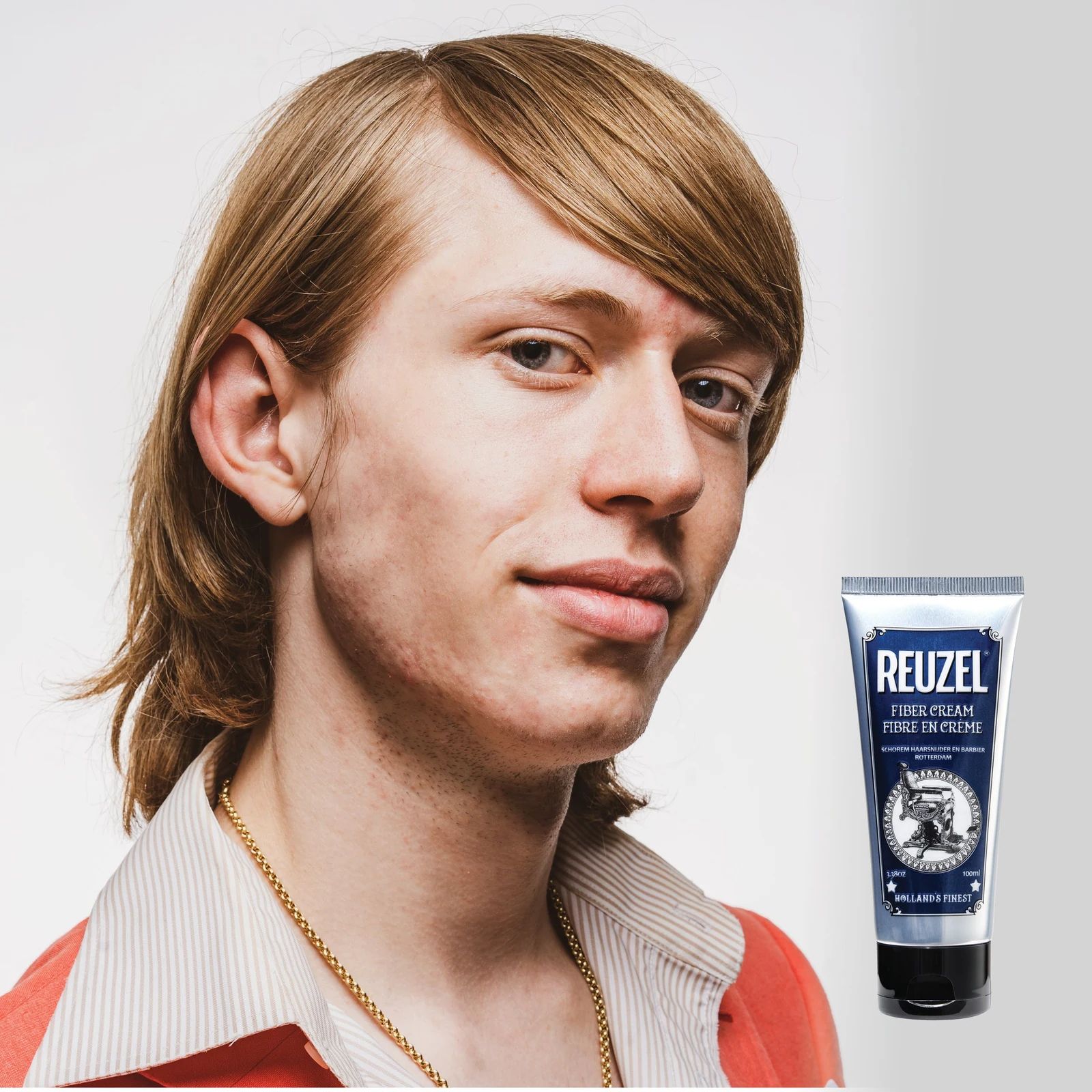 Reuzelinc Fiber Cream in a jar, showing the cream's thick texture and natural fiber styling formula for textured hair., view 7