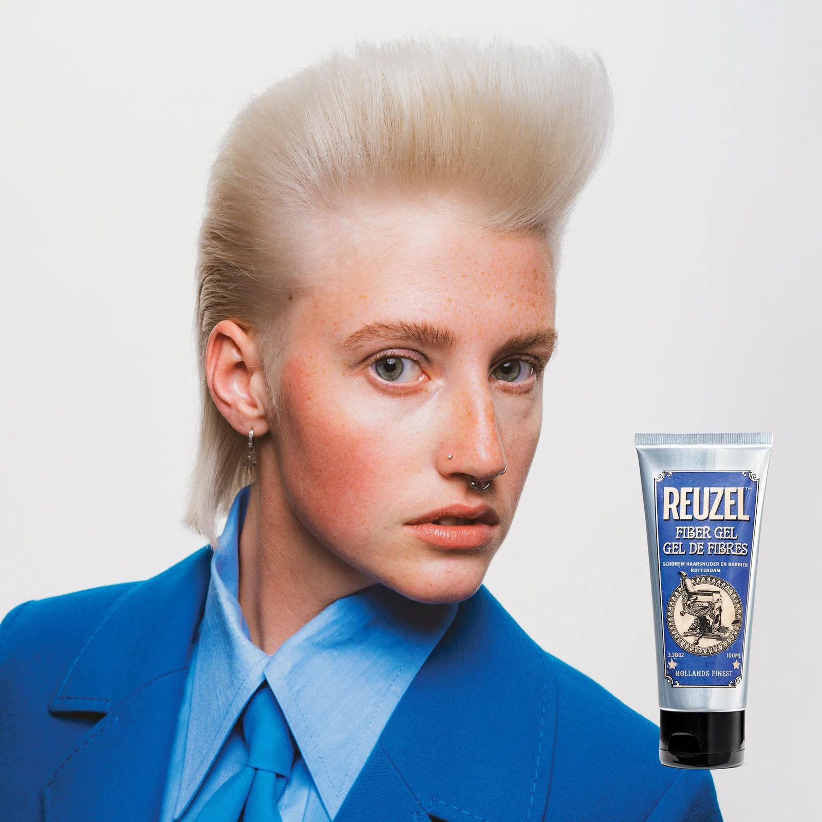 Reuzelinc fiber hair gel in a jar, showing a thick, gel-like consistency for strong hold and textured styling., view 8