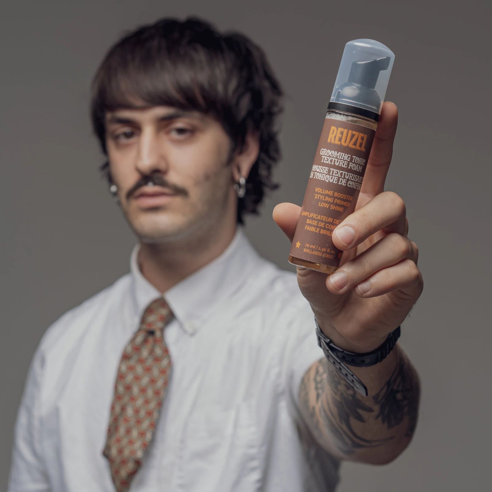 Vendor Grooming Tonic Texture Foam bottle with pump, showcasing the product's sleek packaging and textured foam appearance., view 10