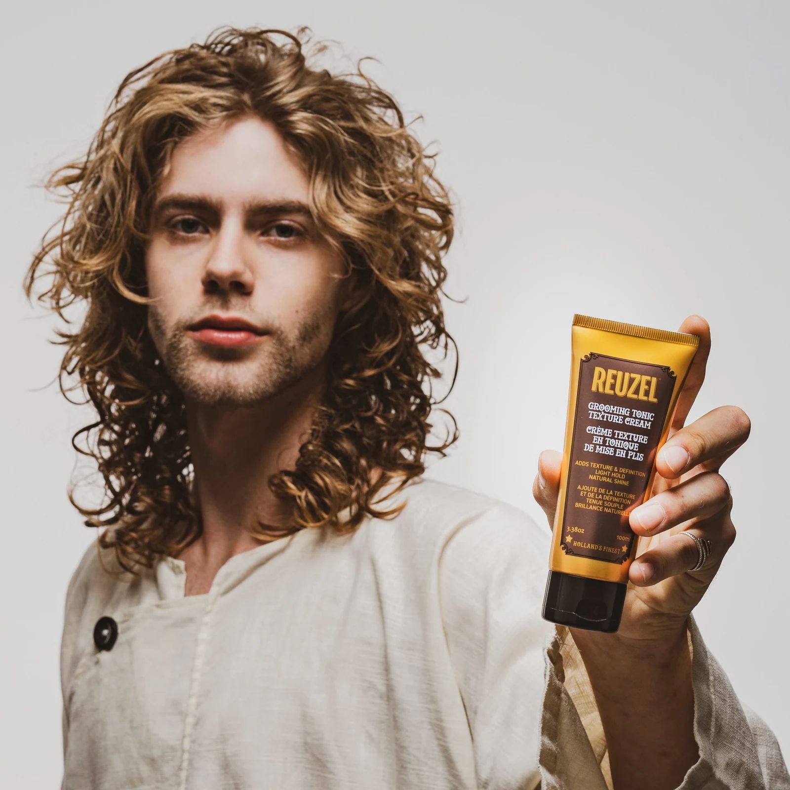 Vendor Grooming Tonic Texture Cream in a jar, showing the creamy grooming product with a smooth, textured surface., view 6