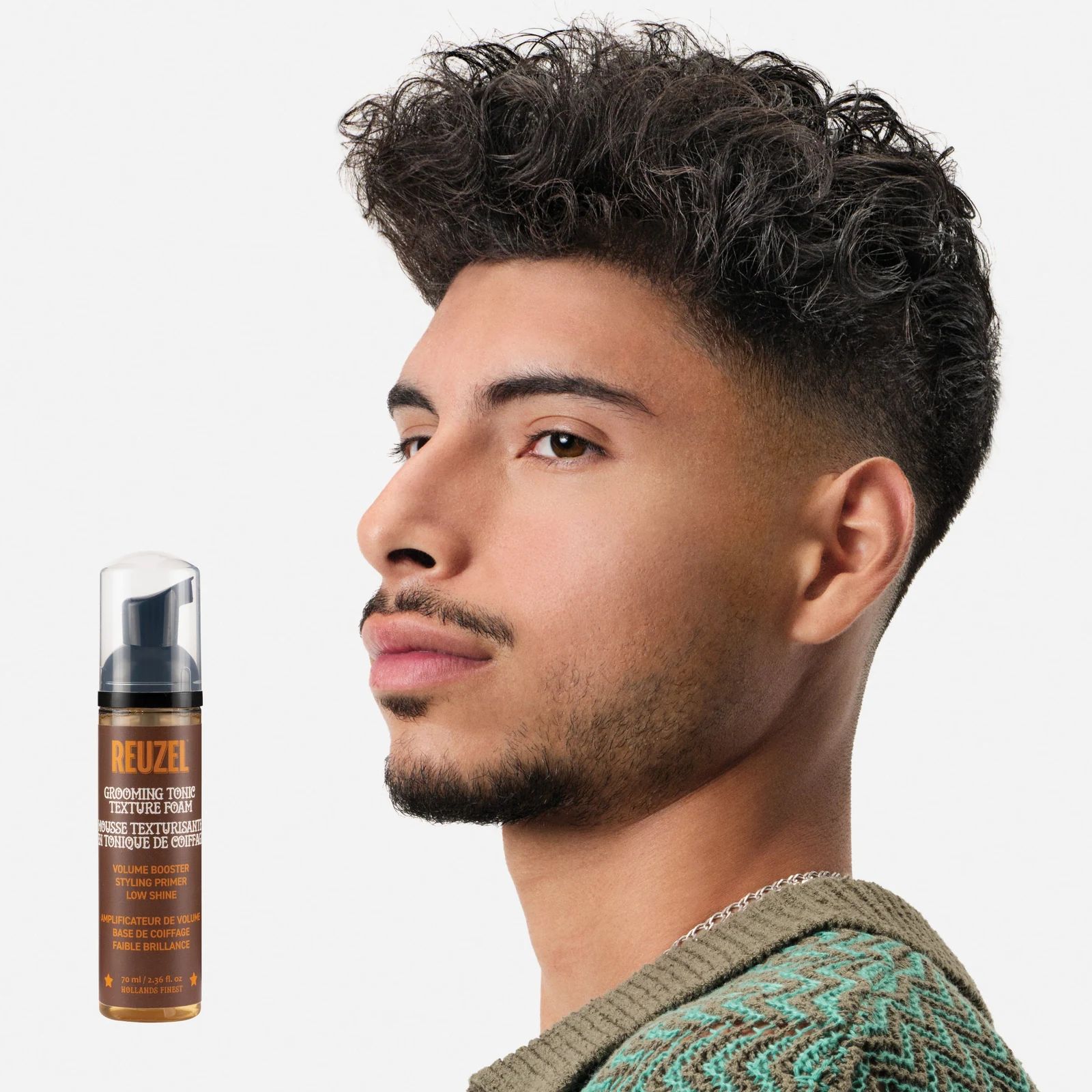 Vendor Grooming Tonic Texture Foam in a bottle, showcasing its creamy foam for styling and texturizing hair., view 8