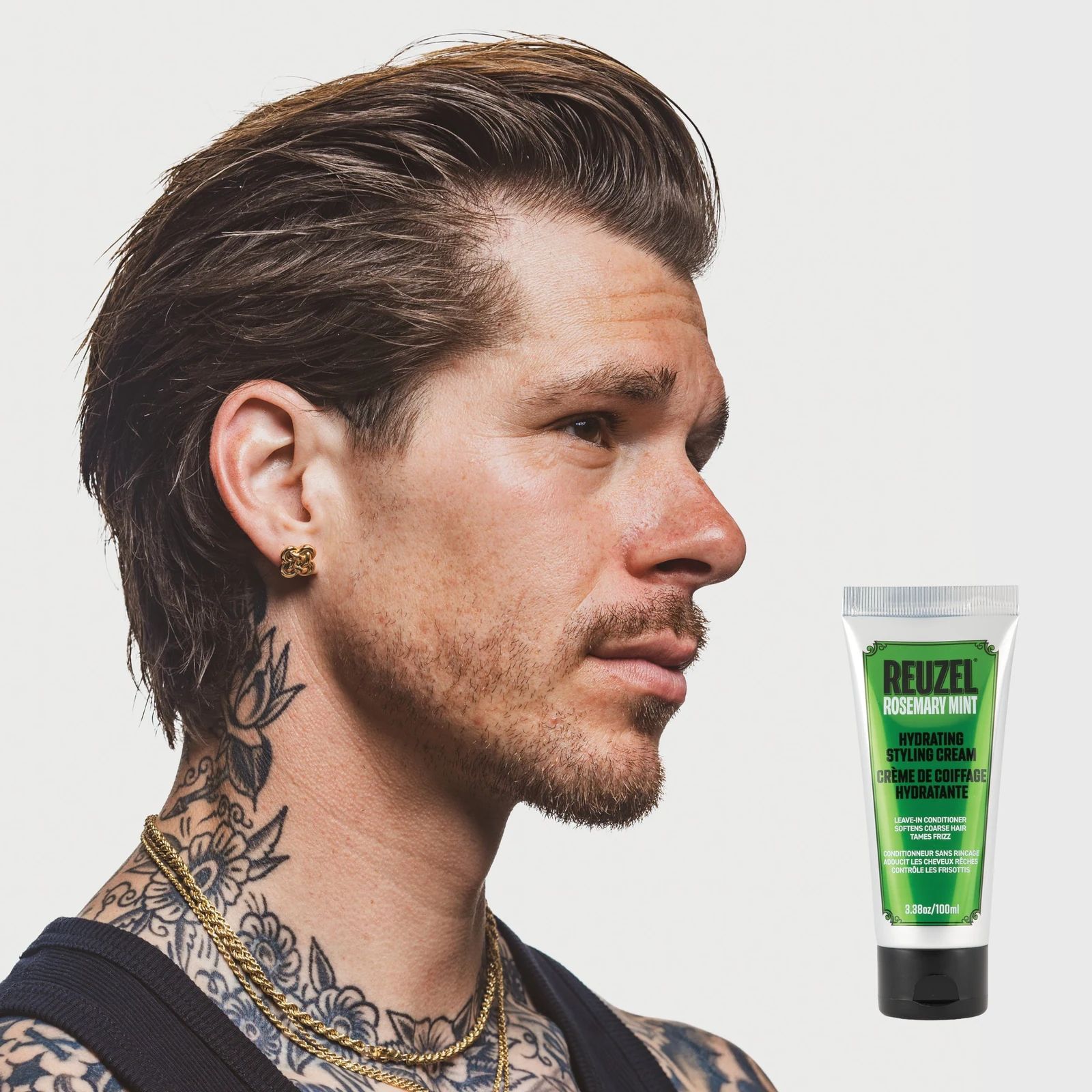 Reuzel - Hydrating Styling Cream: Vendor Hydrating Styling Cream with rosemary and mint, showing the creamy texture and natural ingredients in a jar., view