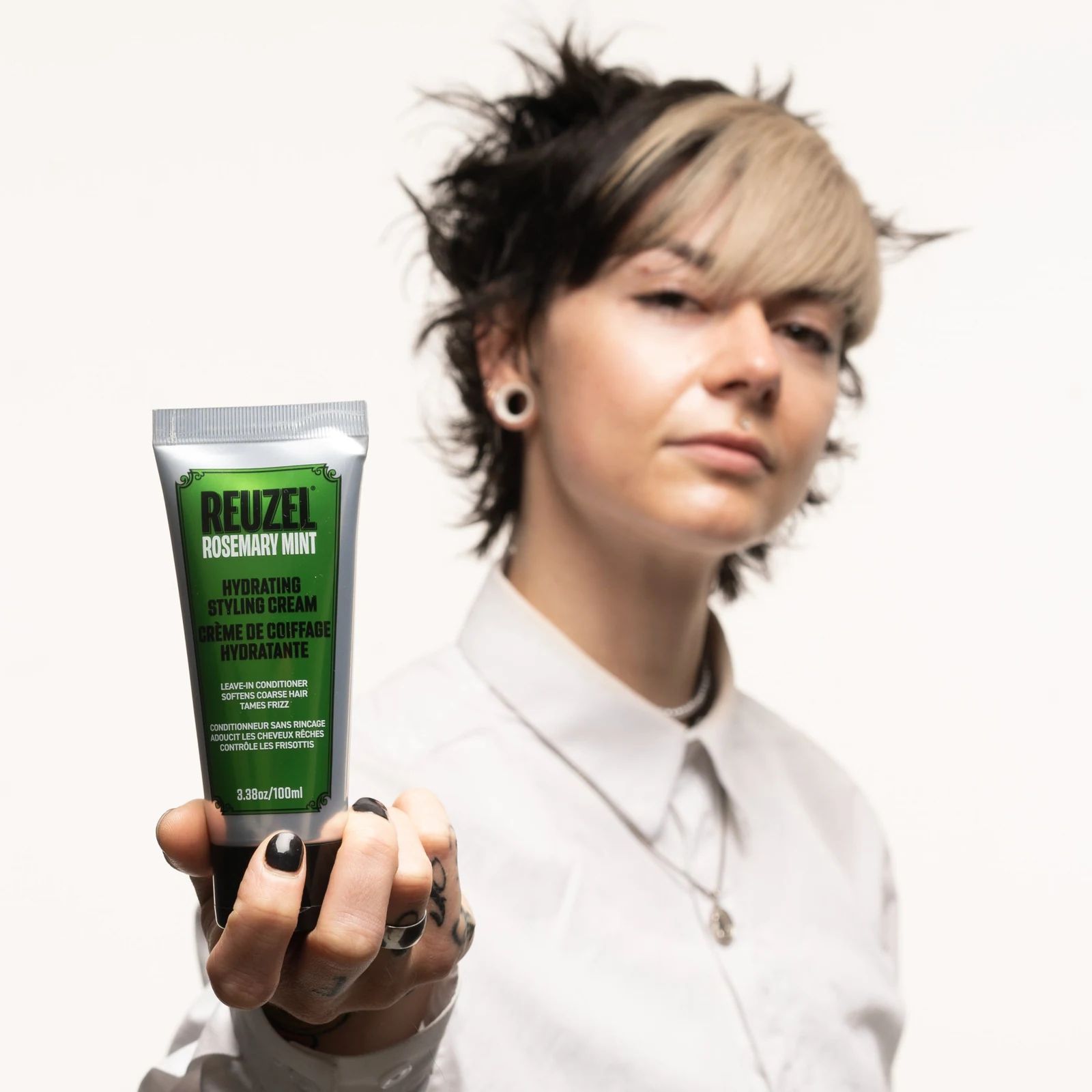 Reuzel - Hydrating Styling Cream: Hydrating Styling Cream by Vendor with rosemary and mint, shown in a jar with fresh rosemary and mint leaves., view 9