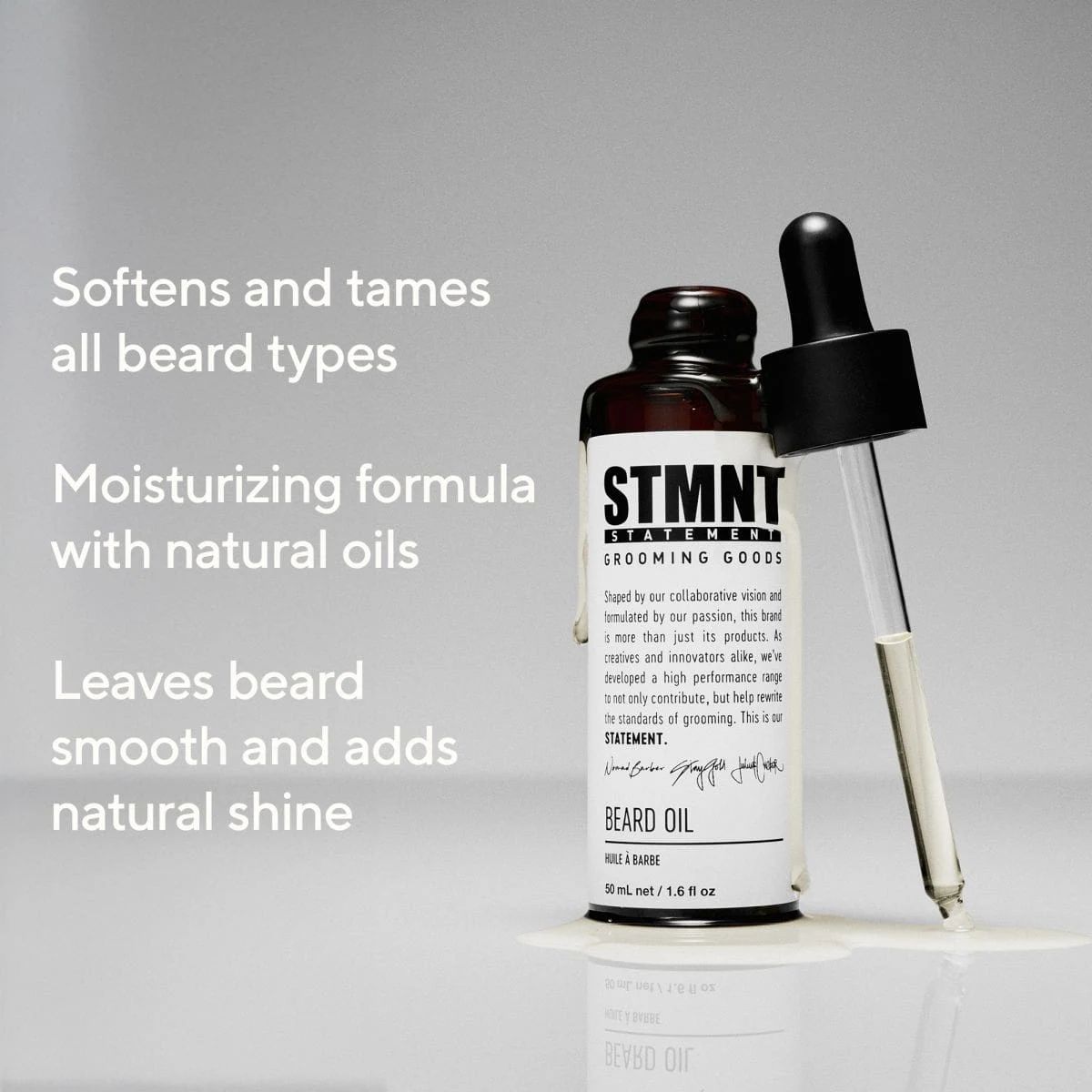 STMNT Beard Oil open bottle and dropper showing the natural oil texture